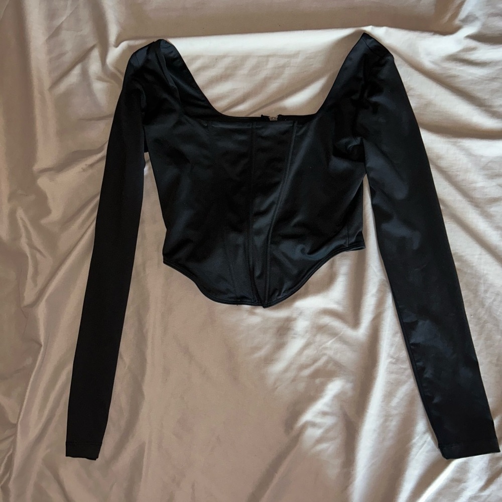 Selling a black long sleeve corset top!
